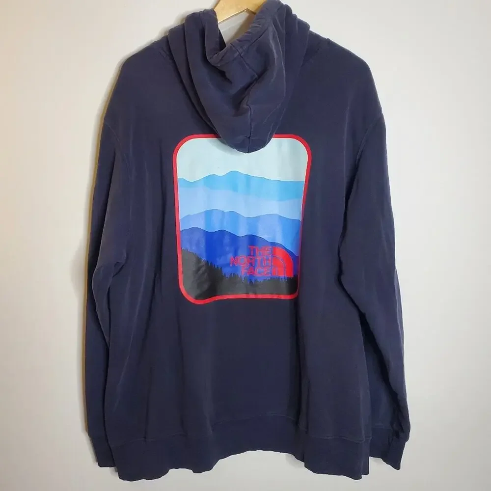 The North face Blue men's graphic back sweatshirt Worn and a bit stretched out